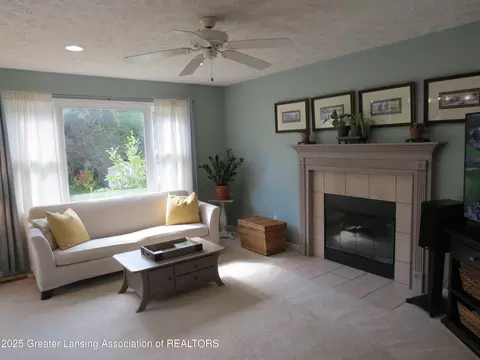 Living - 1111 Lacosta Dr, Dewitt, MI 48820 photo 2 of 3