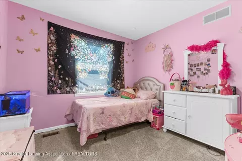 Bedroom - 7519 Echo Ln, Lansing, MI 48917 photo 5 of 8