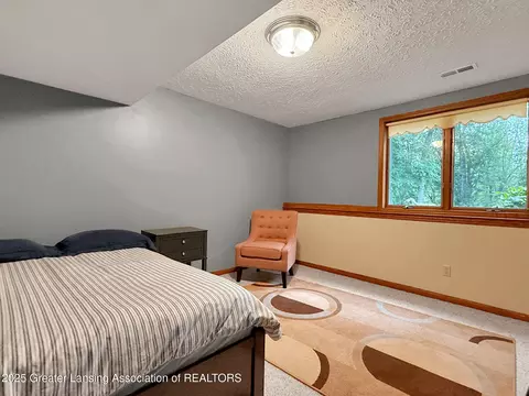 Bedroom - 3710 W Herbison Rd, Dewitt, MI 48820 photo 7 of 8