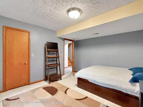 Bedroom - 3710 W Herbison Rd, Dewitt, MI 48820 photo 8 of 8