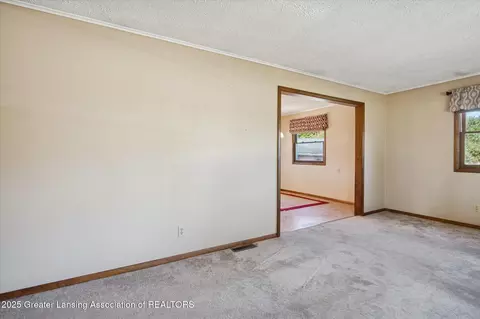 Living - 9520 Fenner Rd, Perry, MI 48872 photo 3 of 3