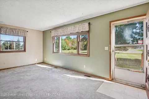 Living - 9520 Fenner Rd, Perry, MI 48872 photo 1 of 3