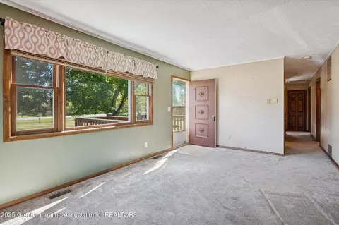 Living - 9520 Fenner Rd, Perry, MI 48872 photo 2 of 3