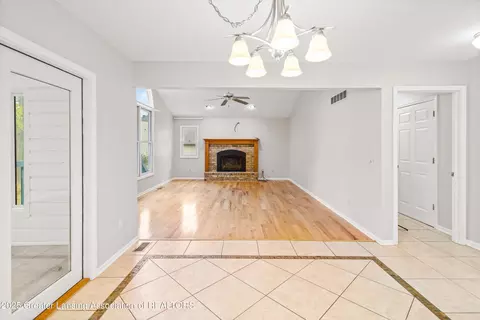 Living - 746 Tanbark Dr, Dimondale, MI 48821 photo 4 of 15