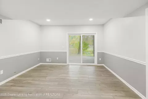Living - 746 Tanbark Dr, Dimondale, MI 48821 photo 13 of 15