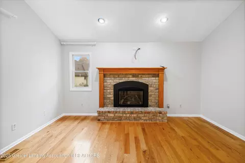 Living - 746 Tanbark Dr, Dimondale, MI 48821 photo 9 of 15