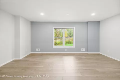 Living - 746 Tanbark Dr, Dimondale, MI 48821 photo 15 of 15