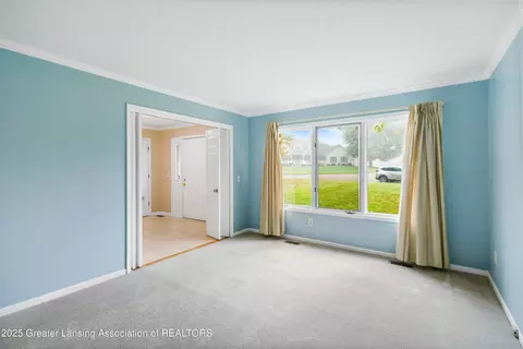 Living - 746 Tanbark Dr, Dimondale, MI 48821 photo 2 of 15