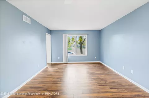 Living - 746 Tanbark Dr, Dimondale, MI 48821 photo 12 of 15