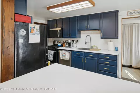 Kitchen - 230 W Washington St, Maple Rapids, MI 48853 photo 2 of 4