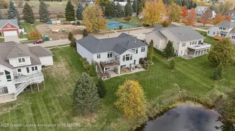 View/Area - 411 Bubbling Spring Ct, Mason, MI 48854 photo 8 of 11