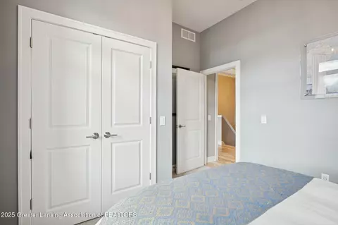 Bedroom - 411 Bubbling Spring Ct, Mason, MI 48854 photo 4 of 8