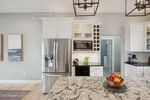 Kitchen - 411 Bubbling Spring Ct, Mason, MI 48854 photo 2 of 5