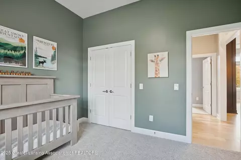 Bedroom - 411 Bubbling Spring Ct, Mason, MI 48854 photo 6 of 8