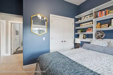 Bedroom - 411 Bubbling Spring Ct, Mason, MI 48854 photo 8 of 8