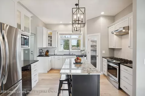 Kitchen - 411 Bubbling Spring Ct, Mason, MI 48854 photo 1 of 5