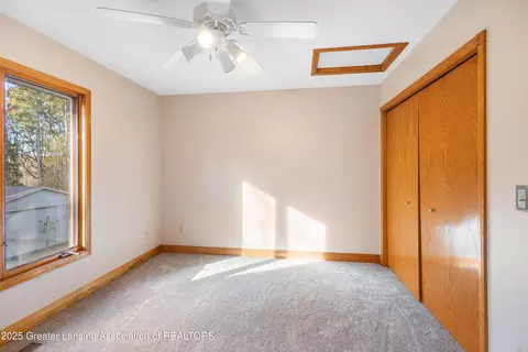 Bedroom - 1155 W Maple Rapids Rd, Saint Johns, MI 48879 photo 6 of 9
