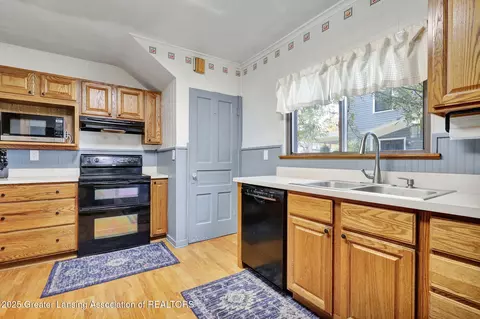 Kitchen - 317 Elm St, Mason, MI 48854 photo 2 of 3