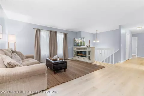 Living - 1511 Waxwing Dr, Dewitt, MI 48820 photo 2 of 2