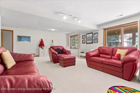 Living - 1120 Rolling Green Ln, Lansing, MI 48917 photo 2 of 2