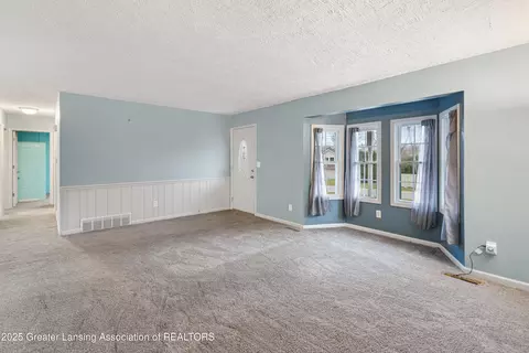 Living - 416 Riverview Dr, Dewitt, MI 48820 photo 3 of 5