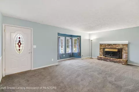 Living - 416 Riverview Dr, Dewitt, MI 48820 photo 1 of 5
