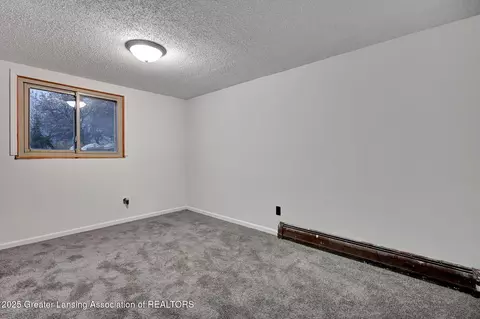 Bedroom - 11191 W Chadwick Rd, Eagle, MI 48822 photo 6 of 6