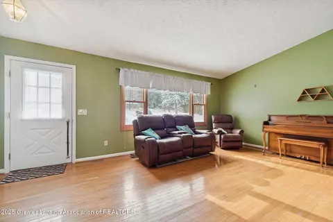 Living - 5125 E Clark Rd, Bath, MI 48808 photo 2 of 6