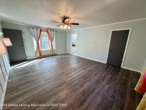 Living - 229 Williamsburg Rd, Lansing, MI 48917 photo 6 of 8