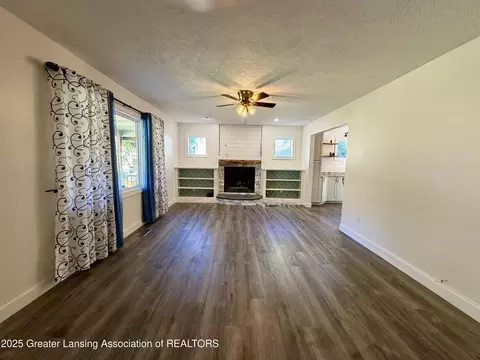 Living - 229 Williamsburg Rd, Lansing, MI 48917 photo 1 of 8