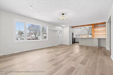 Living - 3322 Pickwick Pl, Lansing, MI 48917 photo 2 of 4