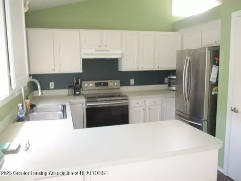 Kitchen - 12885 Isle Royale Dr, Dewitt, MI 48820 photo 2 of 3