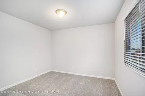 Bedroom - 2891 Moccasin Dr, Dewitt, MI 48820 photo 3 of 4
