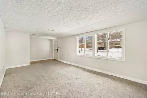 Living - 603 Cherry St, Dewitt, MI 48820 photo 2 of 2