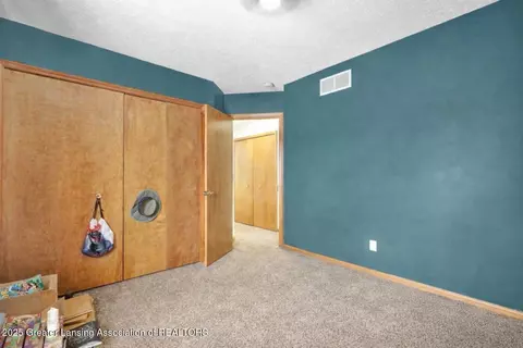 Bedroom - 12805 Ontonagon Dr, Dewitt, MI 48820 photo 5 of 5