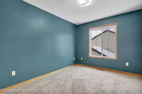 Bedroom - 12805 Ontonagon Dr, Dewitt, MI 48820 photo 3 of 5