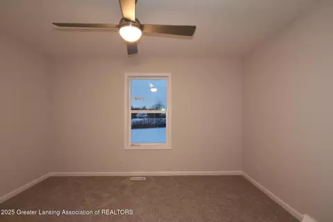 Bedroom - 604 Launch Point Dr, Perry, MI 48872 photo 2 of 4