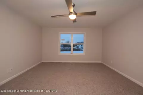 Bedroom - 604 Launch Point Dr, Perry, MI 48872 photo 1 of 4