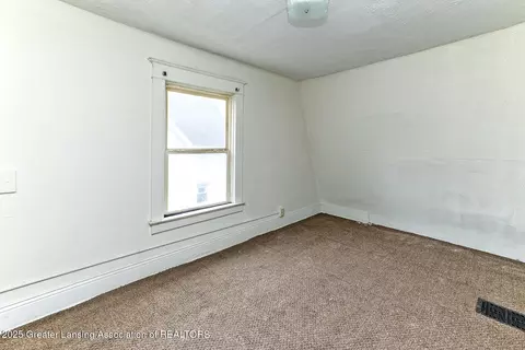 Bedroom - 1026 Eureka St, Lansing, MI 48912 photo 5 of 7