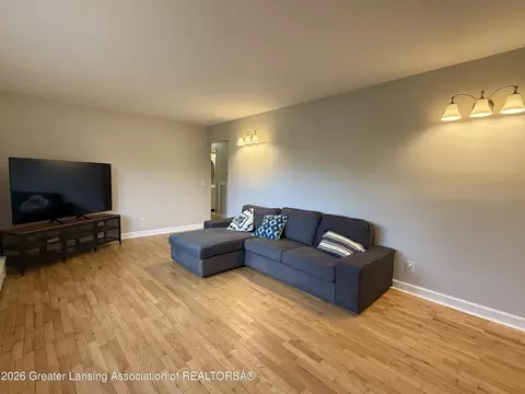 Living - 1465 Primrose Ln, Dewitt, MI 48820 photo 3 of 4