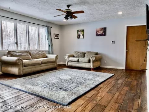 Living - 4875 Wilcox Rd, Holt, MI 48842 photo 2 of 4