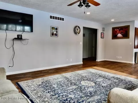 Living - 4875 Wilcox Rd, Holt, MI 48842 photo 3 of 4