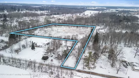 720 E Race Rd, Leslie, MI 49251