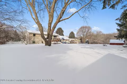 Exterior - 13877 Luroma Cir, Dewitt, MI 48820 photo 3 of 7