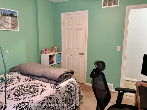 Bedroom - 513 N Scott St, Dewitt, MI 48820 photo 2 of 4