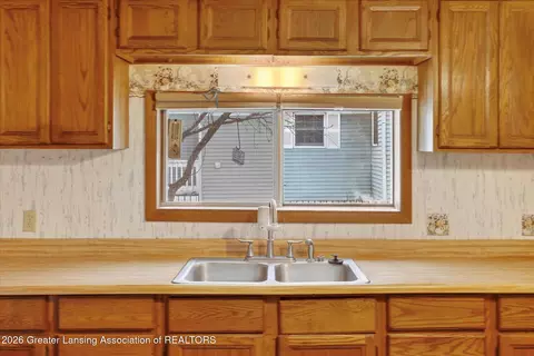 Kitchen - 132 Washington St, Maple Rapids, MI 48853 photo 2 of 2