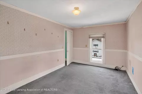 Bedroom - 132 Washington St, Maple Rapids, MI 48853 photo 2 of 9