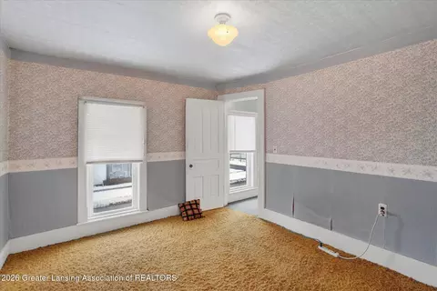 Bedroom - 132 Washington St, Maple Rapids, MI 48853 photo 3 of 9