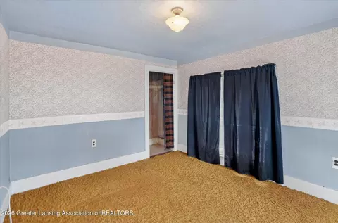 Bedroom - 132 Washington St, Maple Rapids, MI 48853 photo 7 of 9