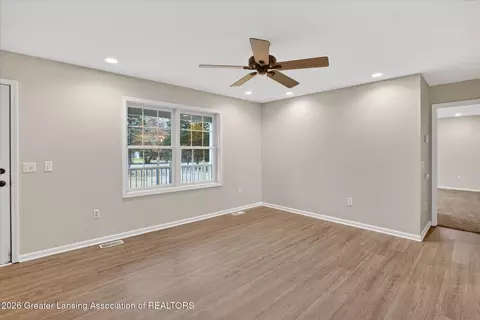 Living - 6902 E Clark Rd, Bath, MI 48808 photo 4 of 4